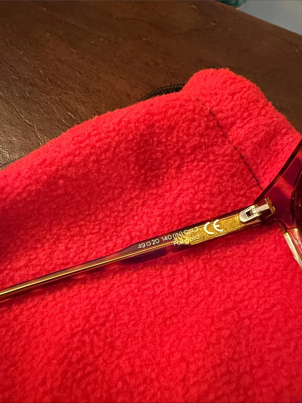 SMITH Tortoiseshell Frame Sunglasses with Gold Bridge and Dark Lenses